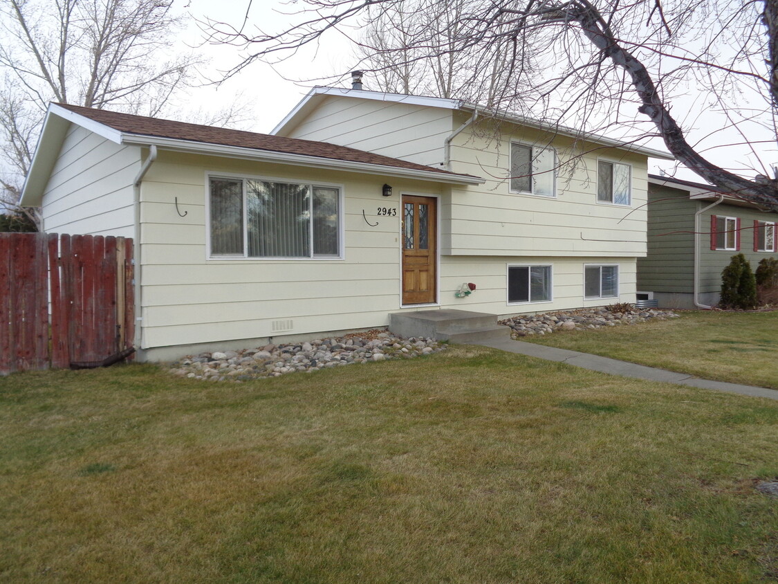 Primary Photo - 4 Bedroom House with Newer Carpet and over...