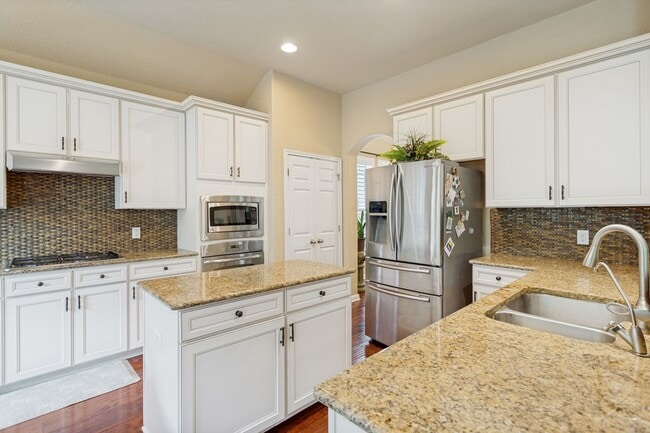 Building Photo - GORGEOUS 5-BEDROOM IN TRIANA SUBDIVISION