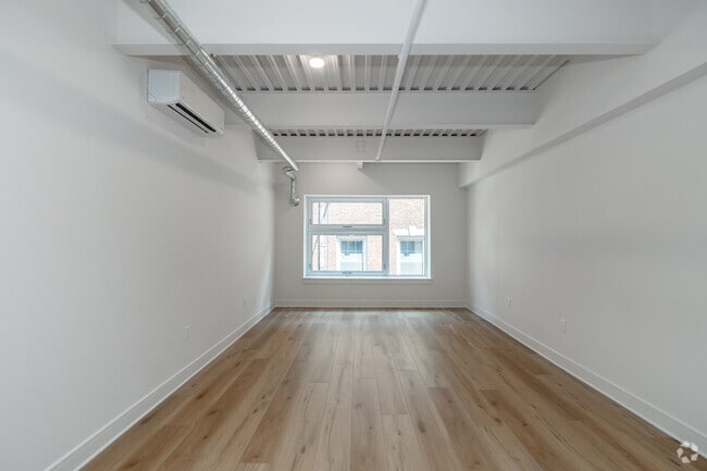 Estudio - 555 pies cuadrados - Sala de estar - The Apartments at 101 North Queen