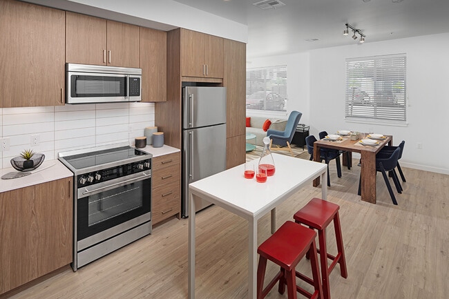 Luxury vinyl plank flooring is featured throughout all entry, kitchen, living/dining and baths - Pace Apartments