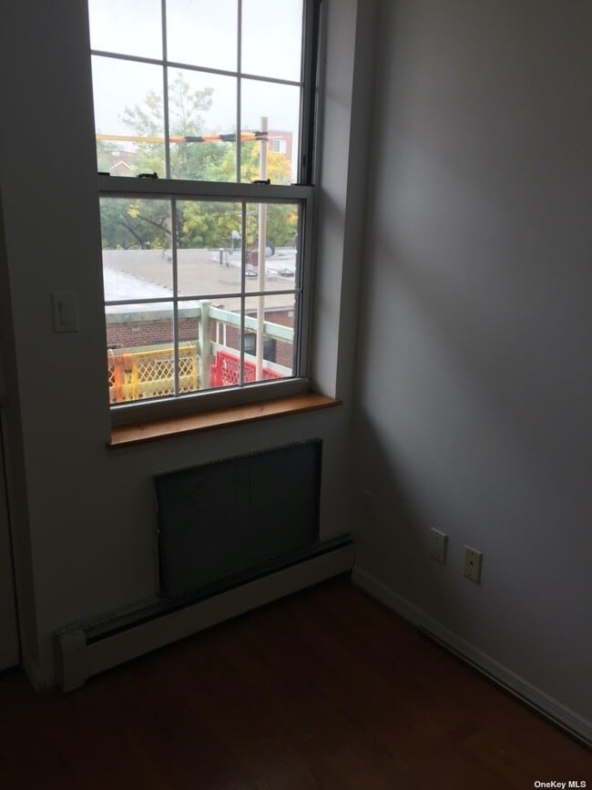 Building Photo - 132-12 Pople Ave