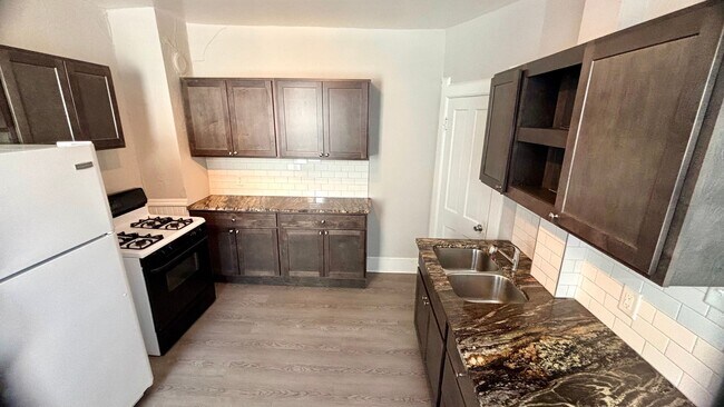 Foto del edificio - 1207 E Kane Pl