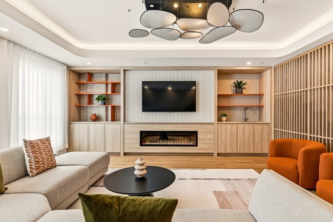 Lounge with fireplace - Elan – condos locatifs