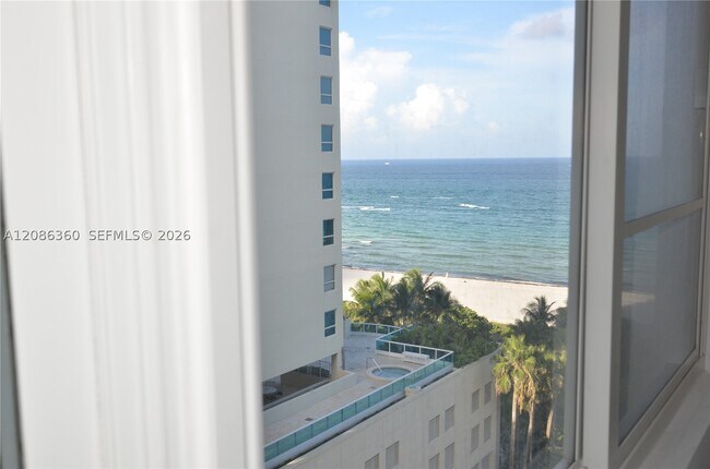 Building Photo - 5005 Collins Ave