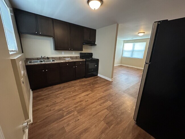 Building Photo - Section 8 Welcome! Charming 2-Bed Duplex i...