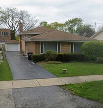 Building Photo - 8818 Mango Ave
