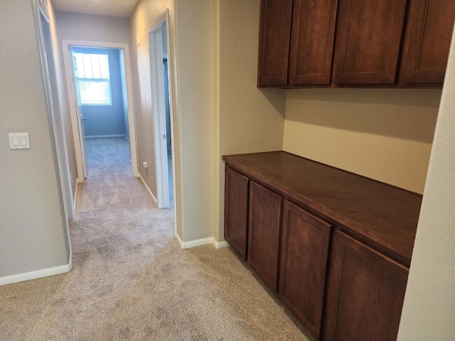 Building Photo - Two Story 3 Bedroom Townhome with 2 Car Garage in Gated Community