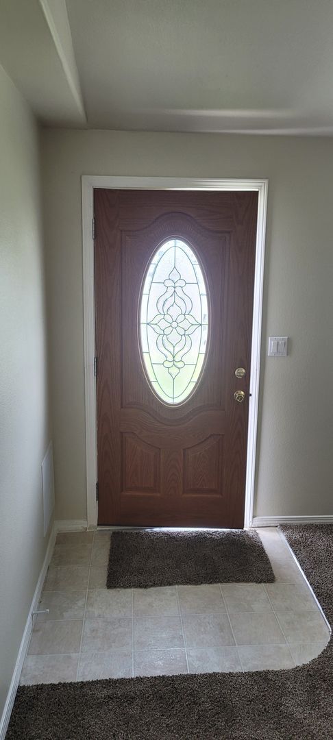 Foto del edificio - Cozy home on large lot w/fenced backyard