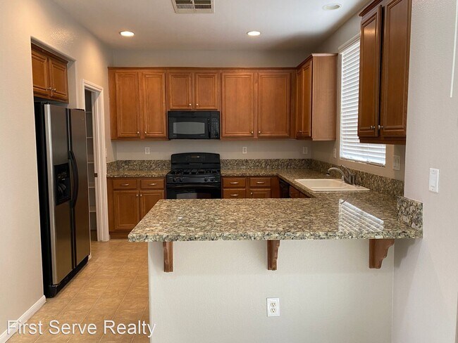 Foto del edificio - 4 br, 2.5 bath House - 1817 Arch Stone Ave