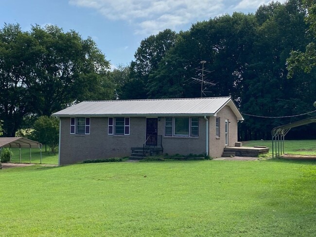 Building Photo - 3 Acres in Sango! All Brick House with Unf...
