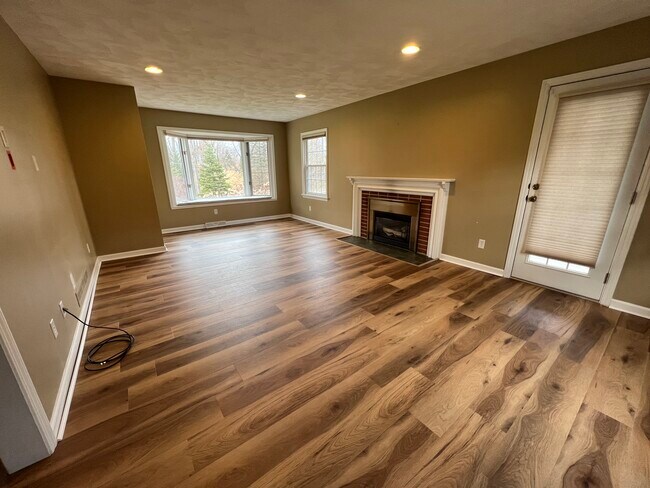 Living Room with new Flooring - 68 Southern Hills Cir