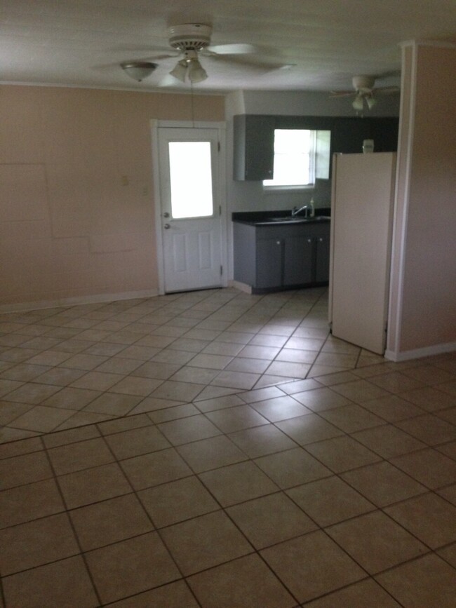 view of the dinning room &amp; kitchen from the living room - 98 Cedar Ln