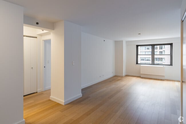 1BR, 1.5BA - 850SF - Living Room - The Nash