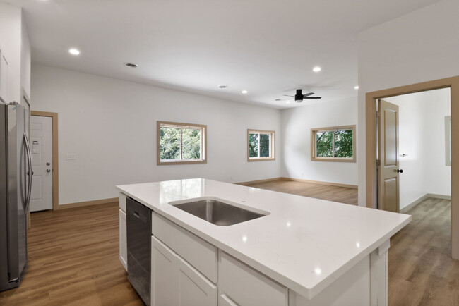 Kitchen fixtures are being installed - 410 Pine Lake Ave