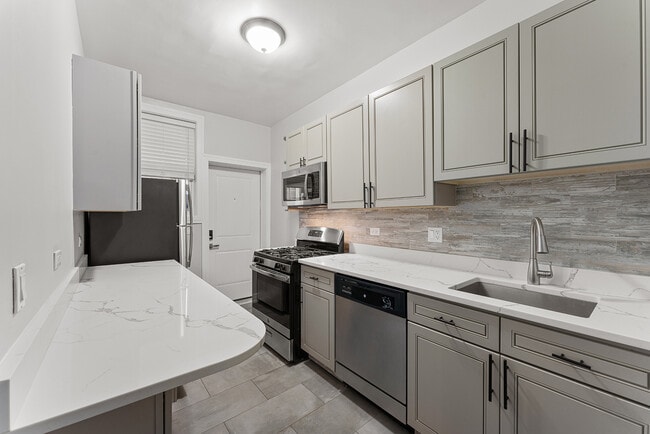 Foto del edificio - 6106 N Winthrop Ave