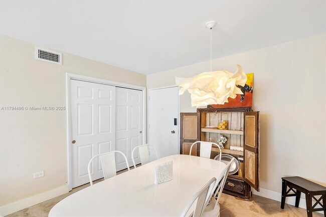 Building Photo - 5555 Collins Ave