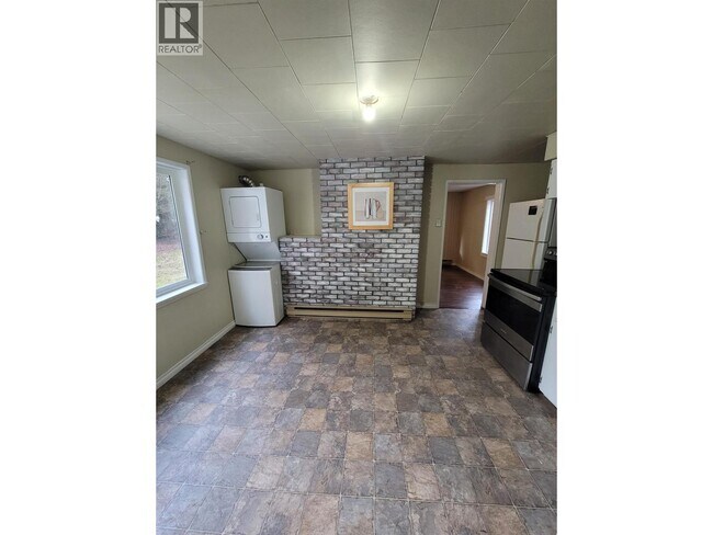 Photo du bâtiment - 27369 Bell Ave