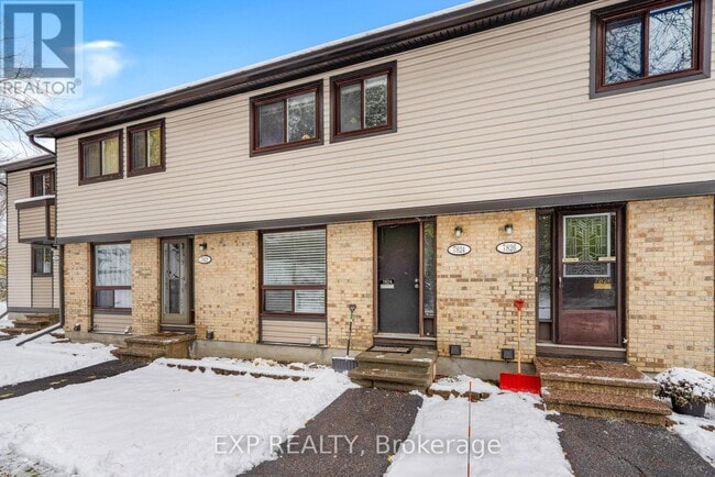 Photo du bâtiment - 7824 Jeanne D'Arc Blvd N