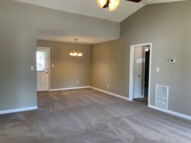 Building Photo - NE Brick Home, Vaulted Ceilings, Front Por...