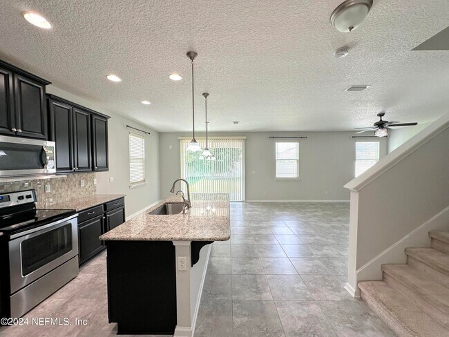 Foto del edificio - 7111 Fleur Cove Dr