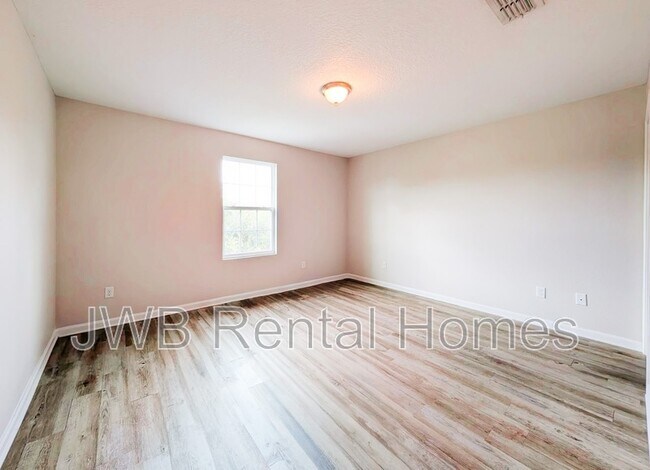 Building Photo - 8474 McGirts Village Ln