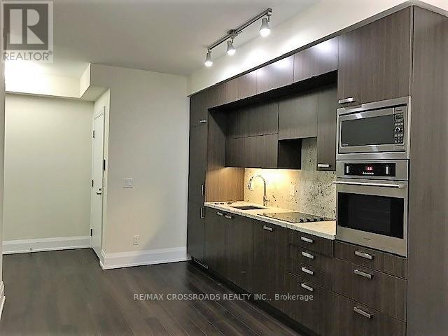 Photo du bâtiment - 120 Harrison Garden Blvd
