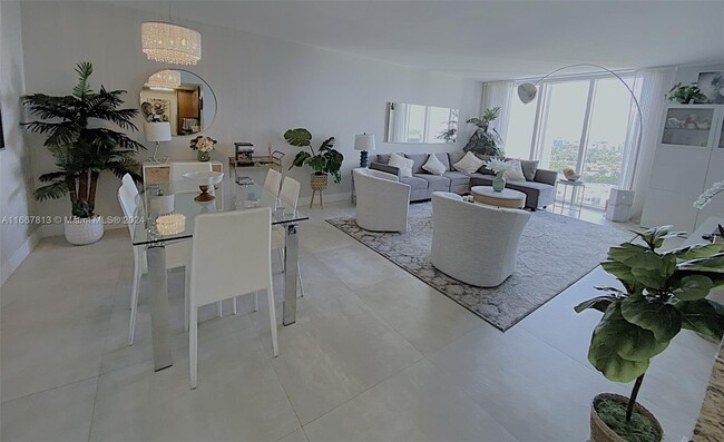 Building Photo - 10275 Collins Ave