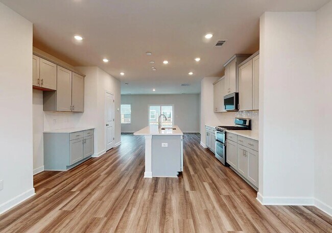 Building Photo - spacious and beautifully appointed townhome
