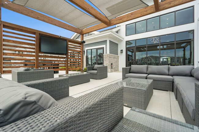 Plainfield Outdoor TV Lounge with Pergola - Seasons at Plainfield