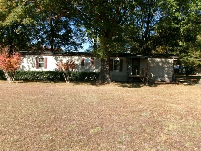 Building Photo - Rural Setting for this Cozy and Comfortabl...