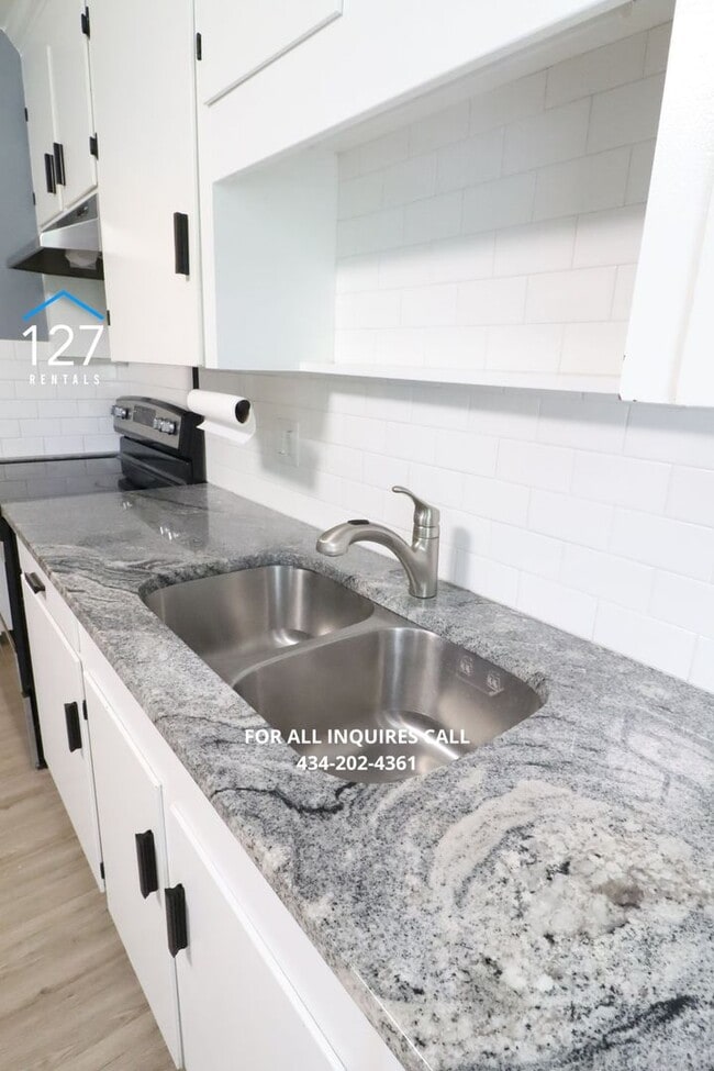 Photo - 2-Bedroom Duplex with In-Unit Laundry & Lawn Care Included! Apartment