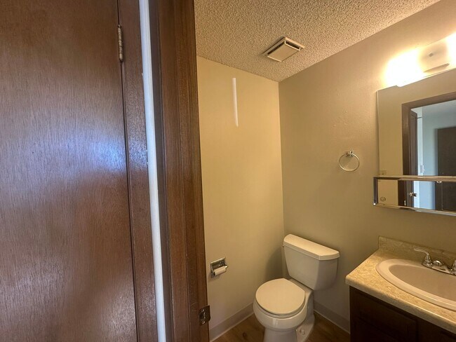 Building Photo - Two Bedroom, One and half bath townhome cl...