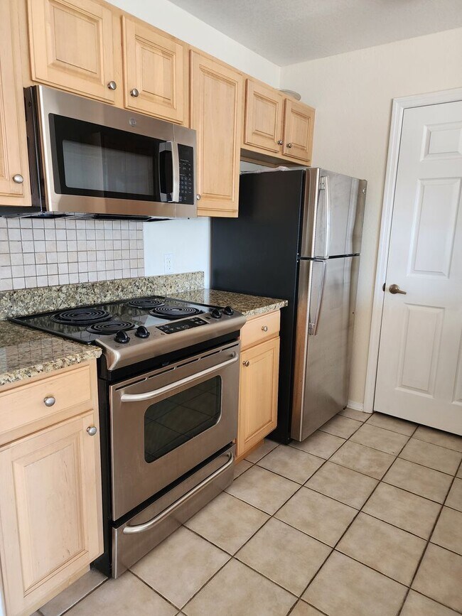 Building Photo - For Lease - 3 BR|2 BA Nautilus Cove Condo!...