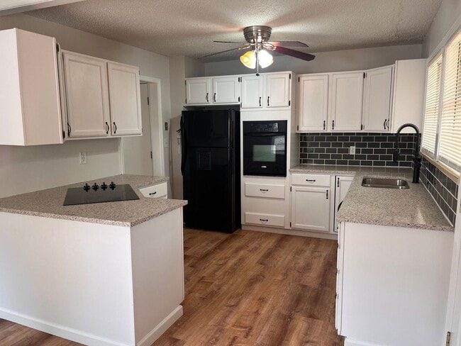 Building Photo - Multi - Level, Updated 3 bed/2bath home in...