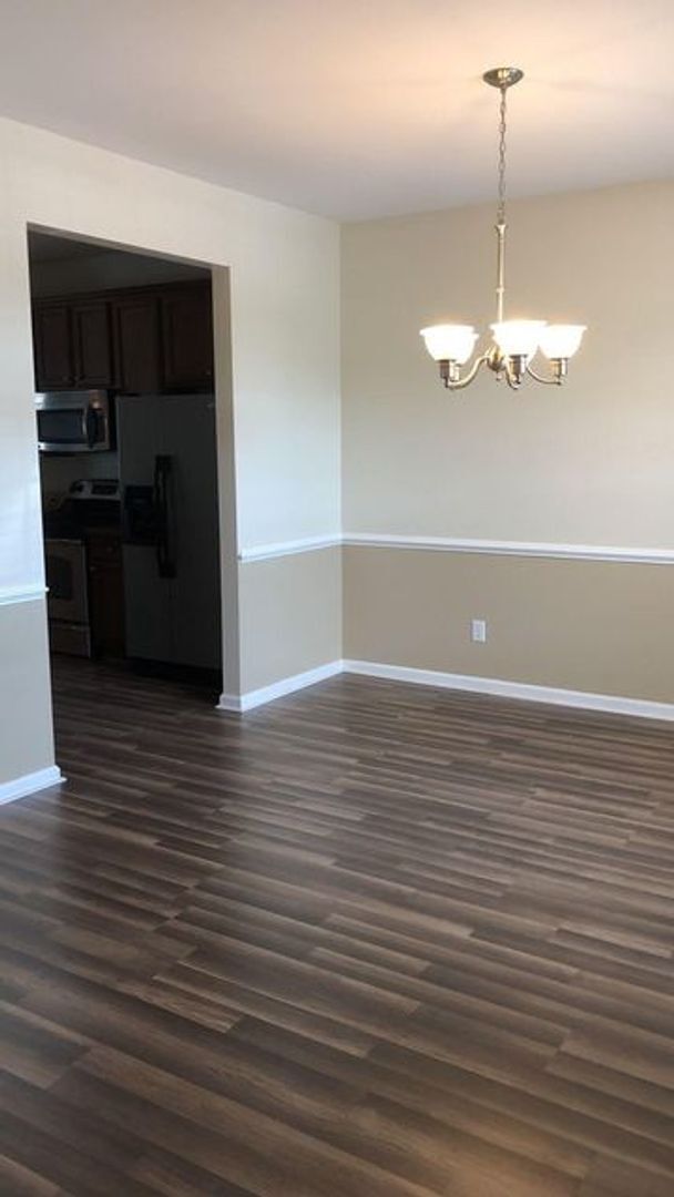 Building Photo - Beautiful Gated Townhome Community