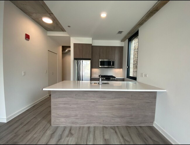 Island and Stainless Steel Appliances - 1118 W Patterson Ave