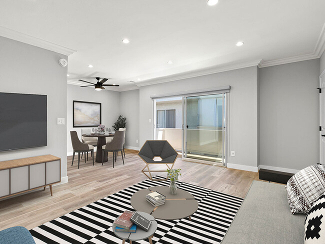 Hardwood floored living room with view of sliding door to private balcony. - Cedar Glen