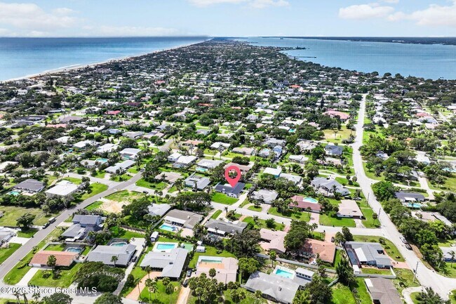 Building Photo - Welcome to this beautifully remodeled 4-bedroom, 3-bath home in the heart of Indialantic Beach!