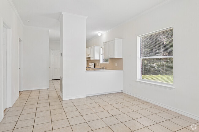 2BR, 2BA - 1,024SF - Dining Area - Whispering Pines Apartments