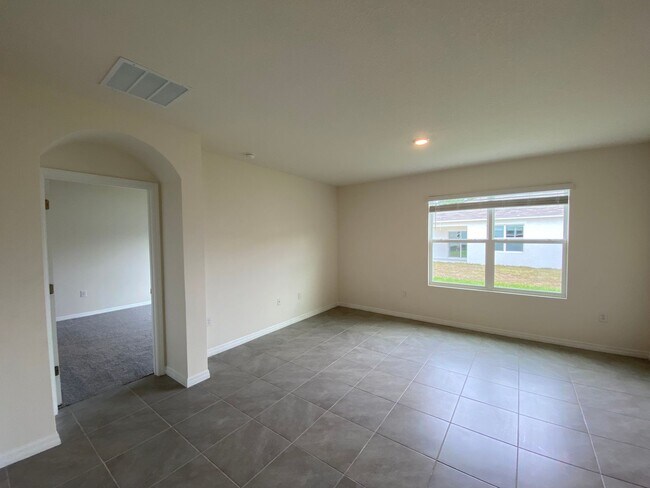 Building Photo - NOT AVAILABLE TO SHOW UNTIL APRIL 3rd. Desirable SE Ocala Neighborhood - Lake Diamond-North - 4/2...