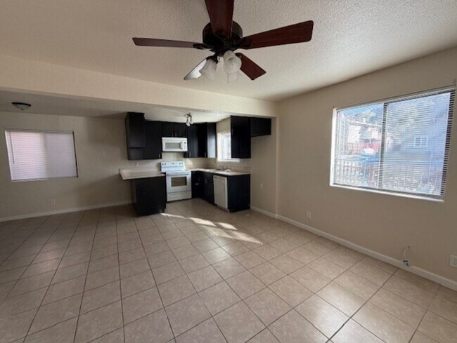 Building Photo - New Paint AND a Yard with a picket fence!
