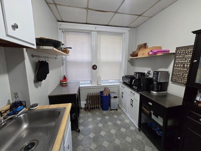 Building Photo - Close to T - Pet Friendly - On site laundry