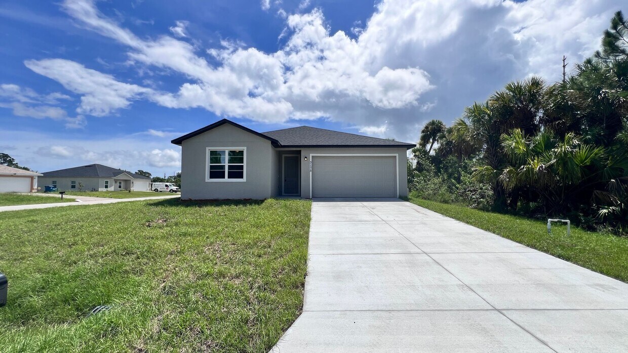Primary Photo - Spacious 3-Bedroom Home with Garage & Pati...
