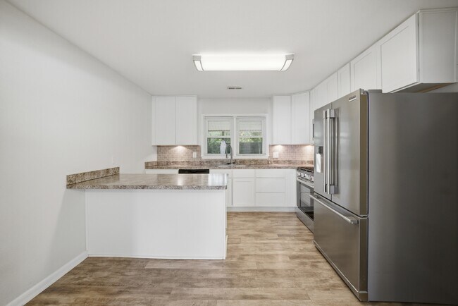 Foto del edificio - 3308 Woodsman Ln
