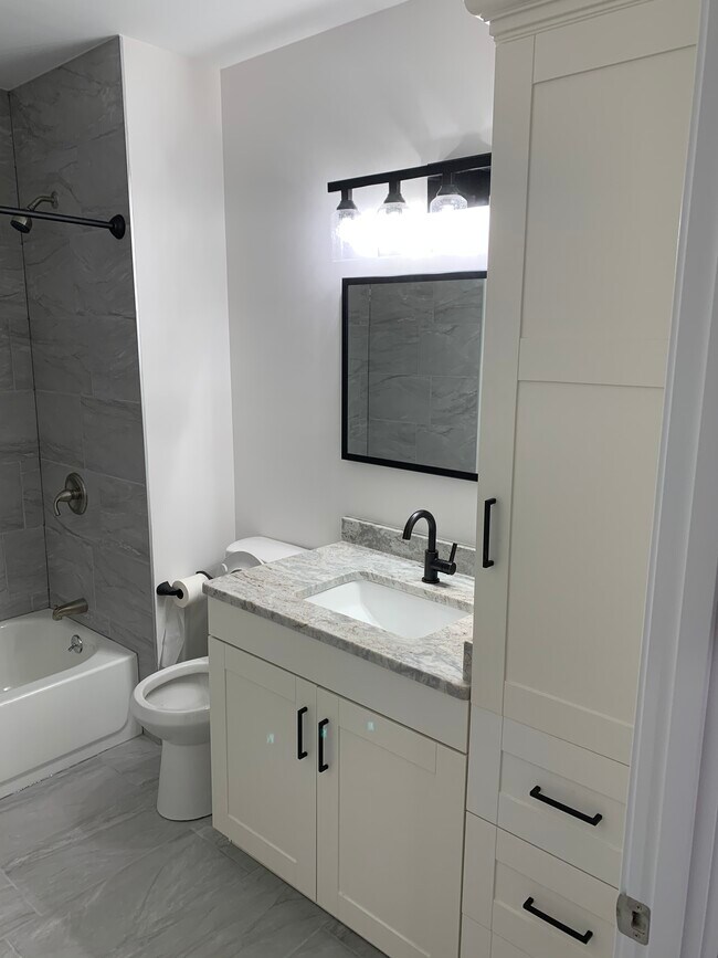Brand new bathroom with granite counter - 826 Hood St