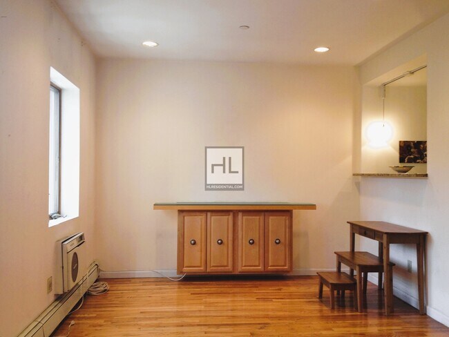 Building Photo - Sundrenched Spacious Studio one block from...