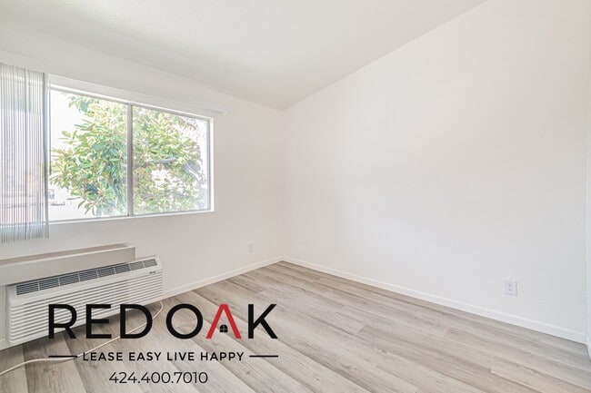 Building Photo - 245 E First St-1-2010