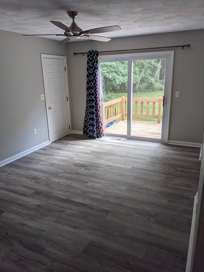 Dining area and slider to deck - 535 Big Water Rd