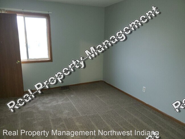 Building Photo - 3 br, 1.5 bath House - 4059 W. 73rd Unit D