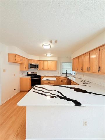 Foto del edificio - 3613 Longbow Ln